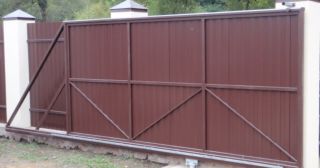 Купить откатные ворота из профнастила Новомосковск, цена от 1750 руб.