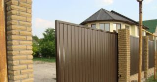 Купить откатные ворота из профнастила Новомосковск, цена от 1750 руб.